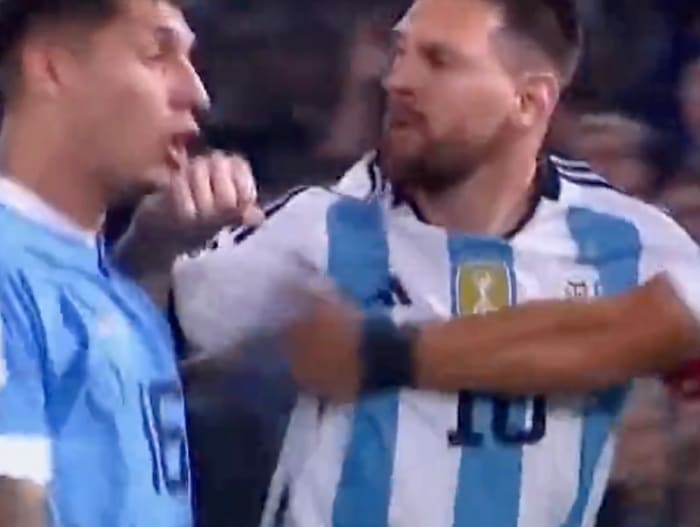 Lionel Messi pictured (right) striking Mathias Olivera during a game between Argentina and Uruguay in November 2023